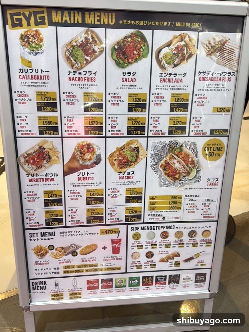 A vertical menu board displaying food items with Japanese and English names, prices in yen, and drink options at the bottom.