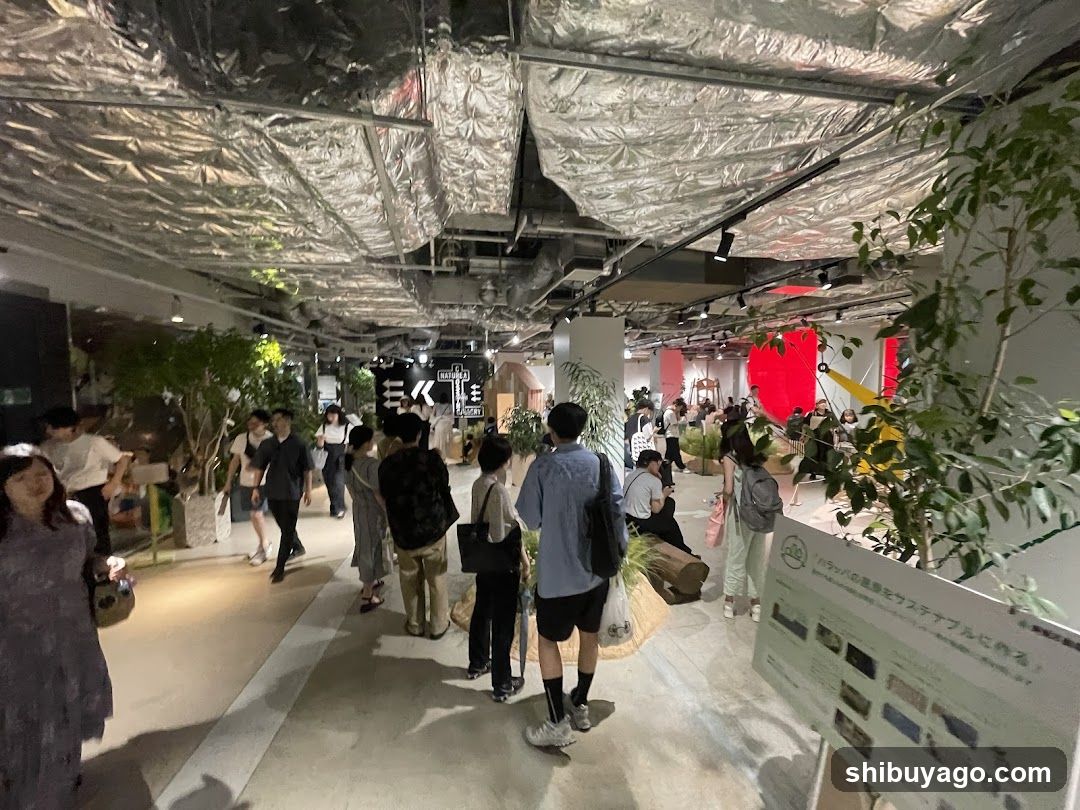 Indoor Exhibition Space with Plants and Visitors