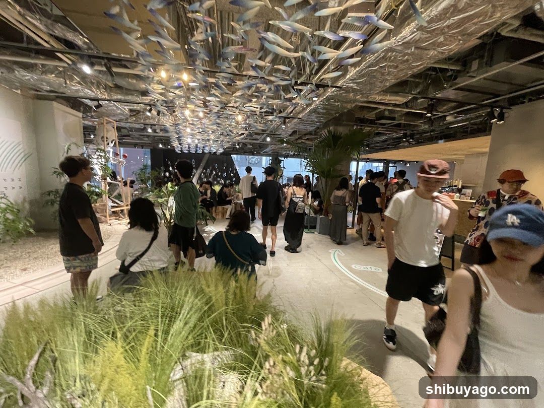 Interior of a modern space with hanging fish decorations and greenery