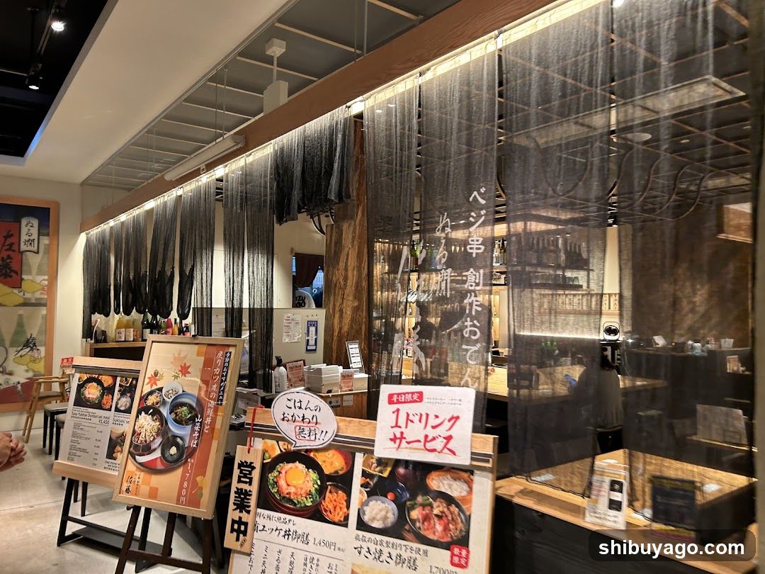 Restaurant Interior View with Menu Boards and Decorative Curtains