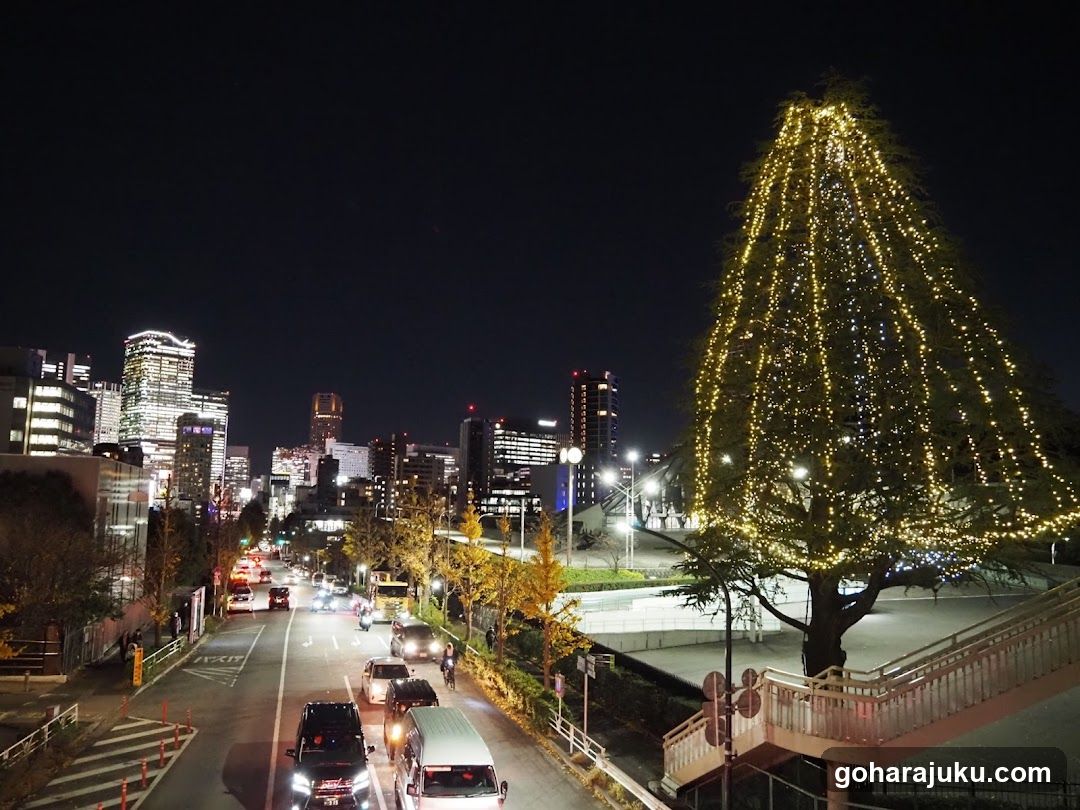 Night Cityscape with Illuminated Tree