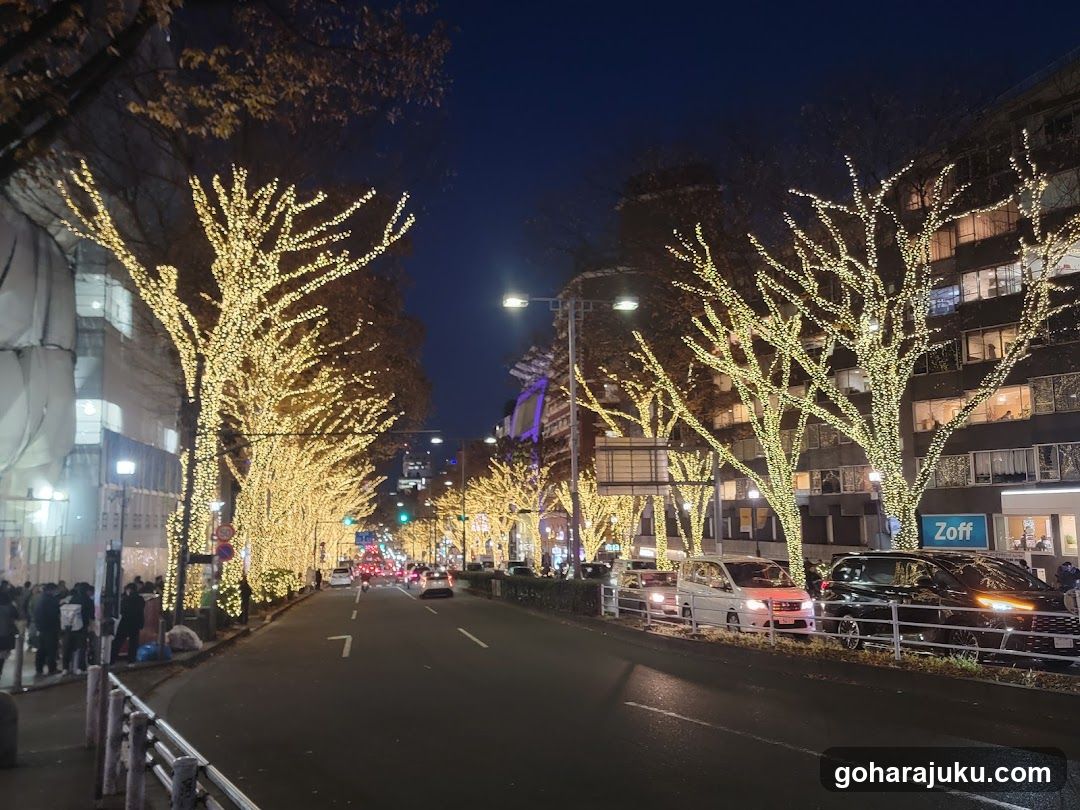 Night street with illuminated trees and cars