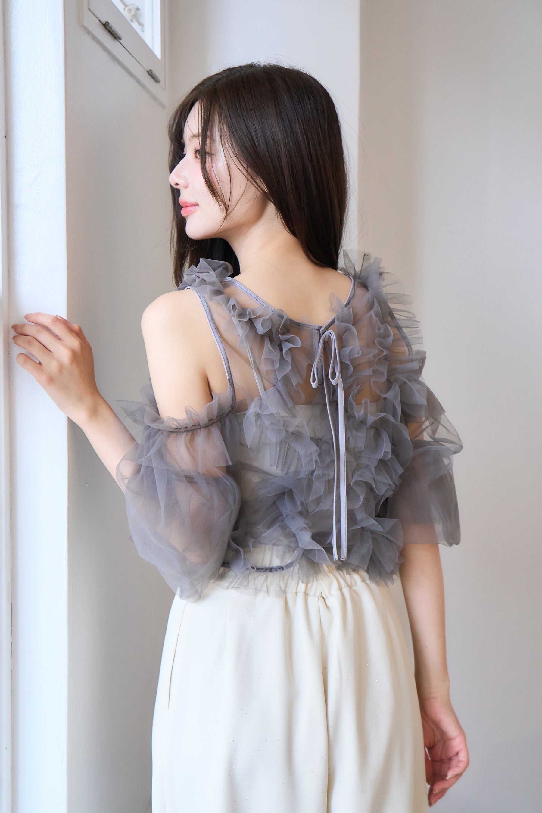 partage tulle tops in limited gray and light blue colors at the POMIII PARTAGE SHIBUYA109 pop-up