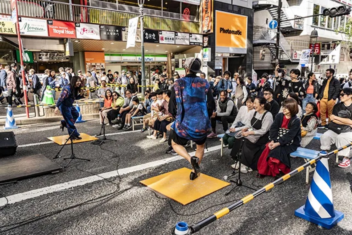 Crowd along a Shibuya street stage during Music Scramble